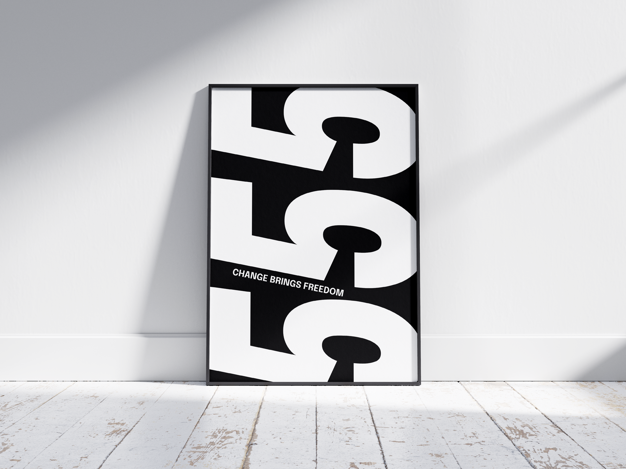 Minimalist black and white abstract poster featuring the repeated number 555 design and the quote "Change brings freedom," framed and leaning against a white wall. Inspiring modern wall art for a transitional, contemporary home or office interior.