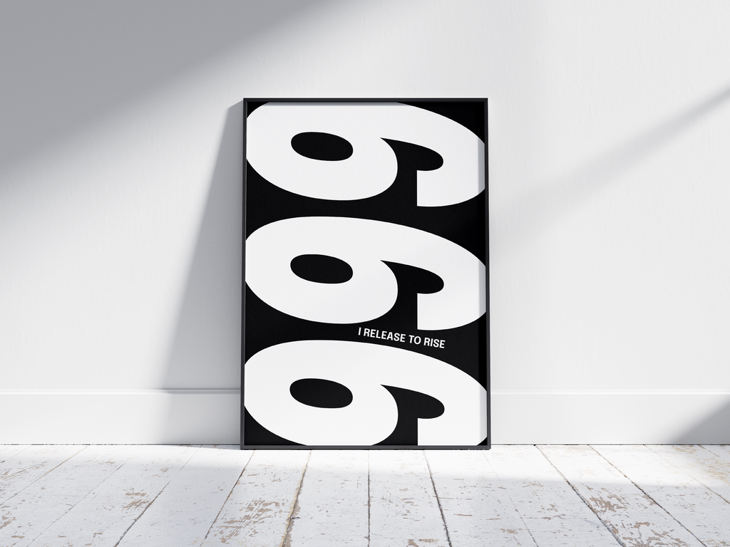 Minimalist black and white abstract poster featuring the repeated number 999 design and the quote "I release to rise," framed and leaning against a white wall. Inspiring modern wall art for a transformative, contemporary home or office interior.