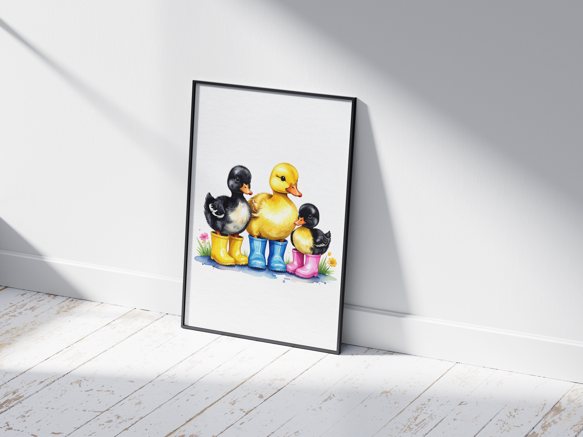 Charming watercolor art poster featuring three adorable ducklings in colorful rain boots (yellow, blue, pink) with subtle flowers, printed on semi-gloss sustainable paper. Perfect wall art for nurseries, children's rooms, or playrooms with a cute and whimsical aesthetic.