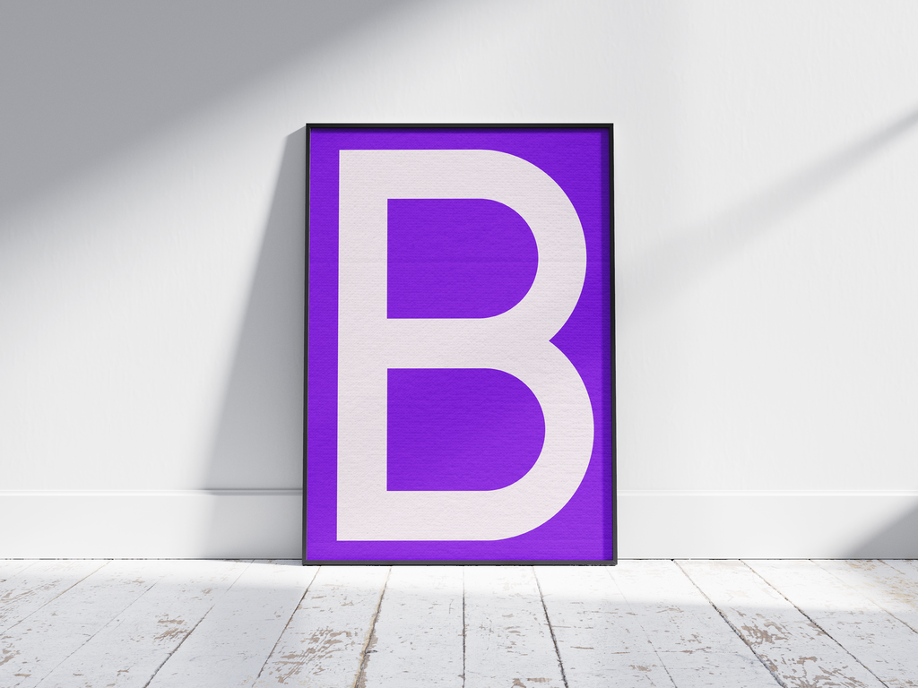 Striking and modern alphabet letter B poster featuring a clean white 'B' on a rich, electric-purple background, printed on semi-gloss paper. Perfect bold wall art for offices, dorms, or gallery walls with a clean, graphic, and vibrant aesthetic.