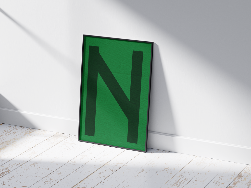 Bold geometric alphabet letter N poster, featuring a dark forest green 'N' on a bright emerald green background. Perfect modern wall art for offices, studies, or gallery walls with a graphic, confident, and monochromatic green aesthetic.