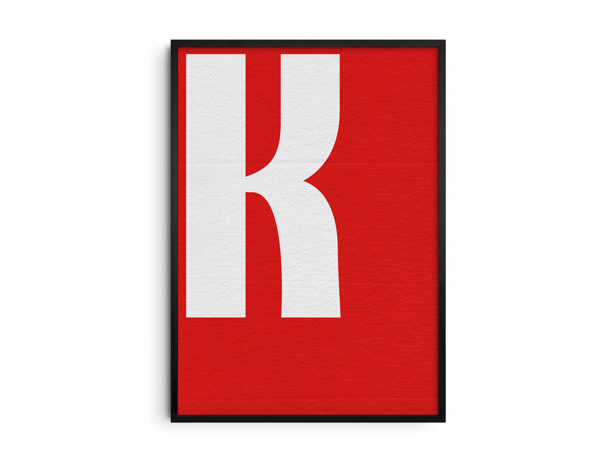 Bold and striking alphabet letter K poster, featuring a crisp white 'K' on a vibrant fire-engine red background. Perfect high-contrast wall art for modern offices, industrial lofts, or gallery walls with a graphic, confident, and minimalist aesthetic.