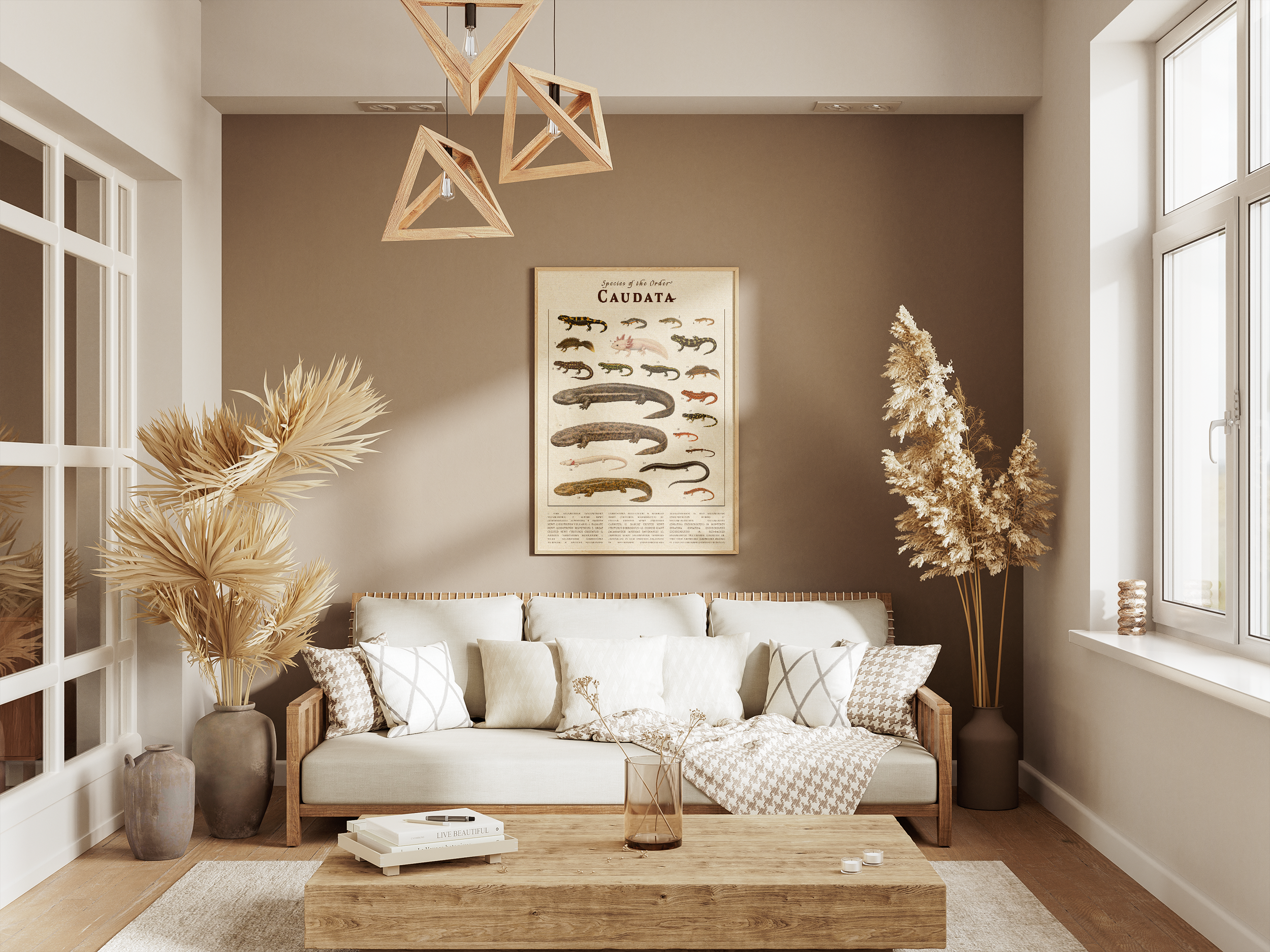 A wide shot of a modern, beige-toned living room. Centered on the main wall is a large vintage poster titled "Caudata," featuring various species of salamanders and newts. The room is decorated with minimalist wooden furniture and dried plants.