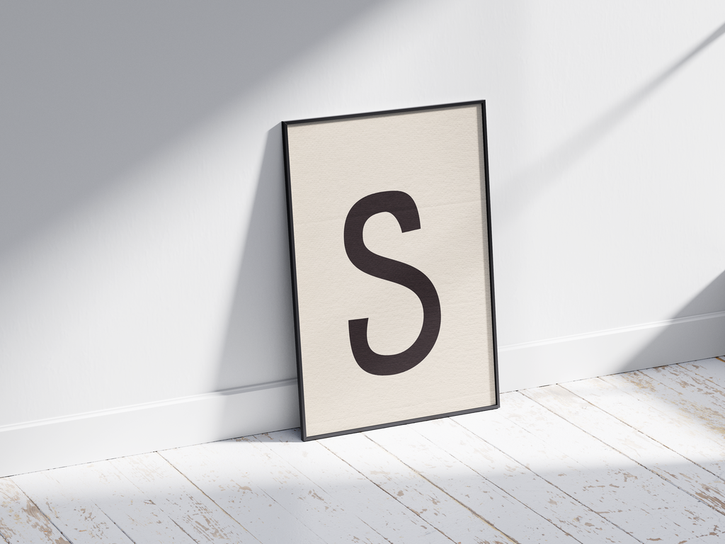 Elegant and classic serif alphabet letter S poster, featuring a smooth, dark charcoal 'S' on a soft cream background. Perfect sophisticated wall art for minimalist offices, libraries, or gallery walls with a timeless, graceful, and monochromatic aesthetic.