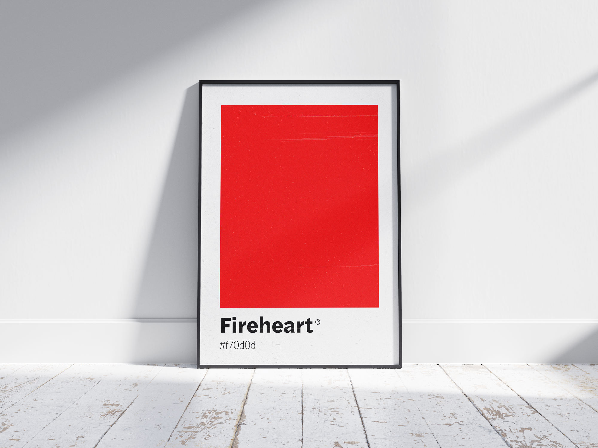 Minimalist red color swatch poster featuring the unique shade "Fireheart" with its hexadecimal code #f70c0d. This modern art print is ideal for adding a sophisticated and vibrant touch to contemporary interiors, dining areas, or gallery walls.