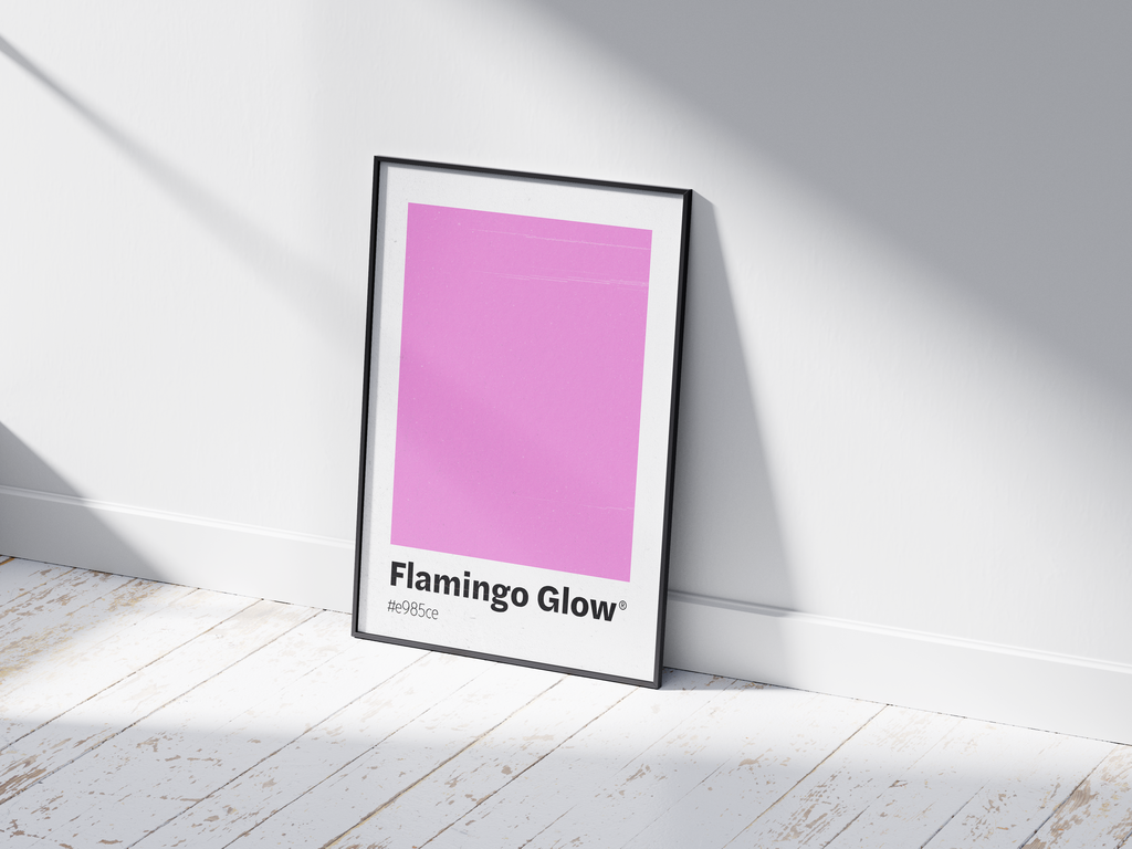 Minimalist pink color swatch poster featuring the unique shade "Flamingo Glow" with its hexadecimal code #e985ce. This modern art print is ideal for adding a sophisticated and vibrant touch to contemporary interiors, bedrooms, or gallery walls.