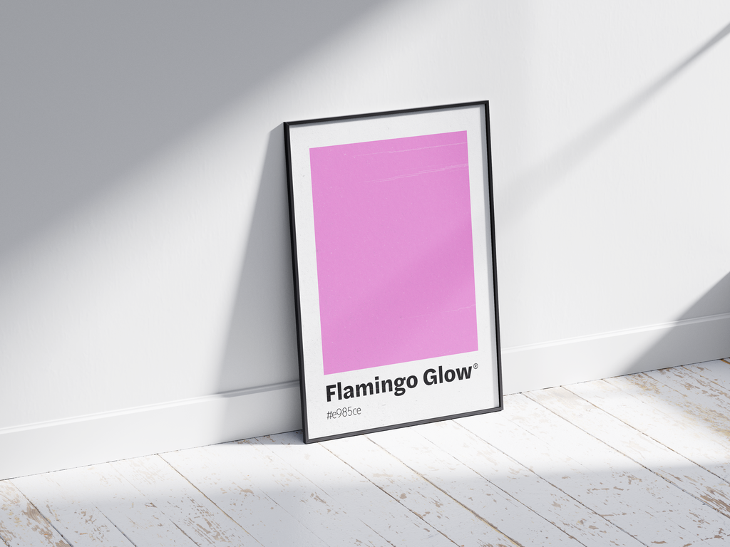 Minimalist pink color swatch poster featuring the unique shade "Flamingo Glow" with its hexadecimal code #e985ce. This modern art print is ideal for adding a sophisticated and vibrant touch to contemporary interiors, bedrooms, or gallery walls.