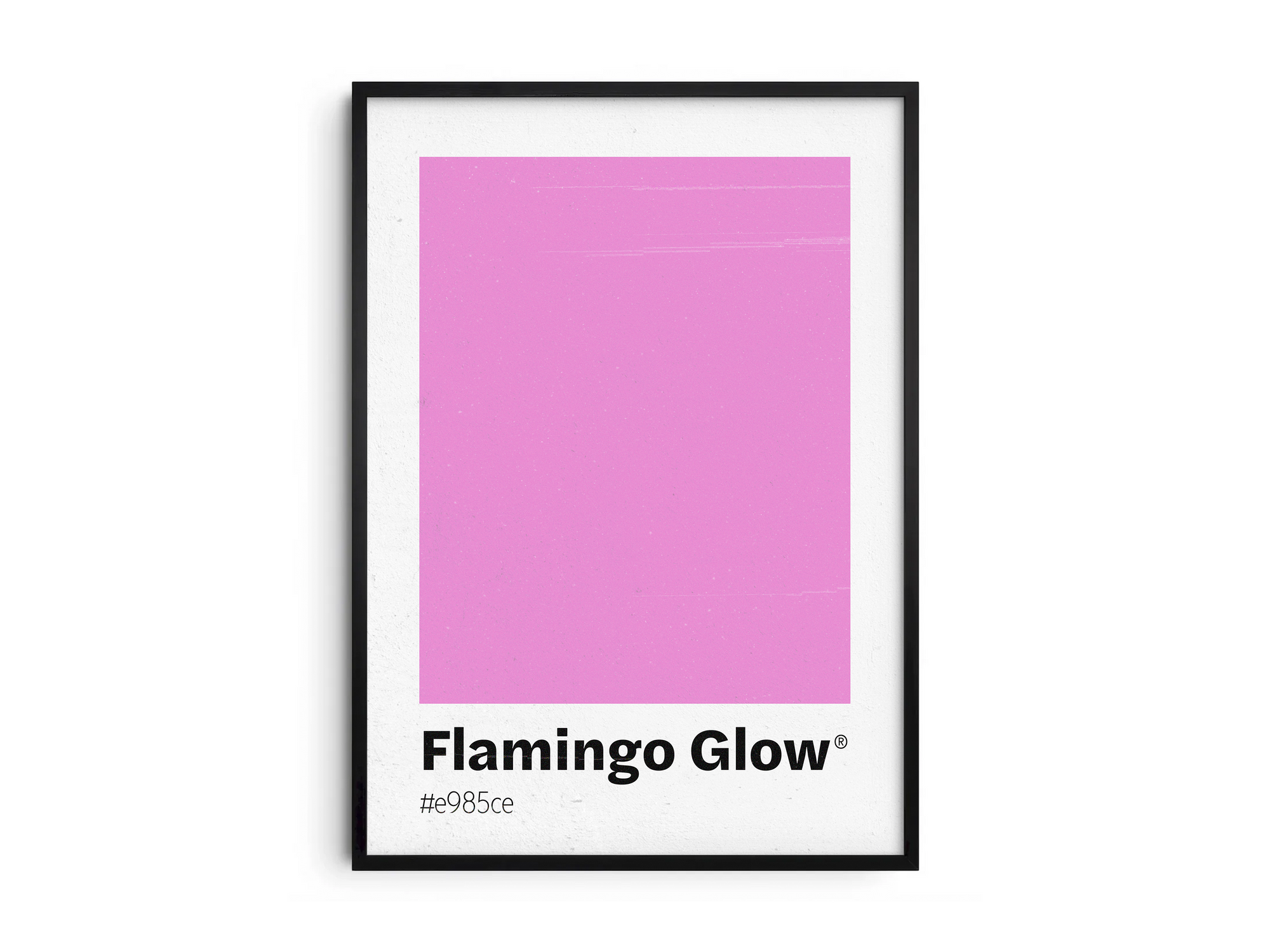 Minimalist pink color swatch poster featuring the unique shade "Flamingo Glow" with its hexadecimal code #e985ce. This modern art print is ideal for adding a sophisticated and vibrant touch to contemporary interiors, bedrooms, or gallery walls.