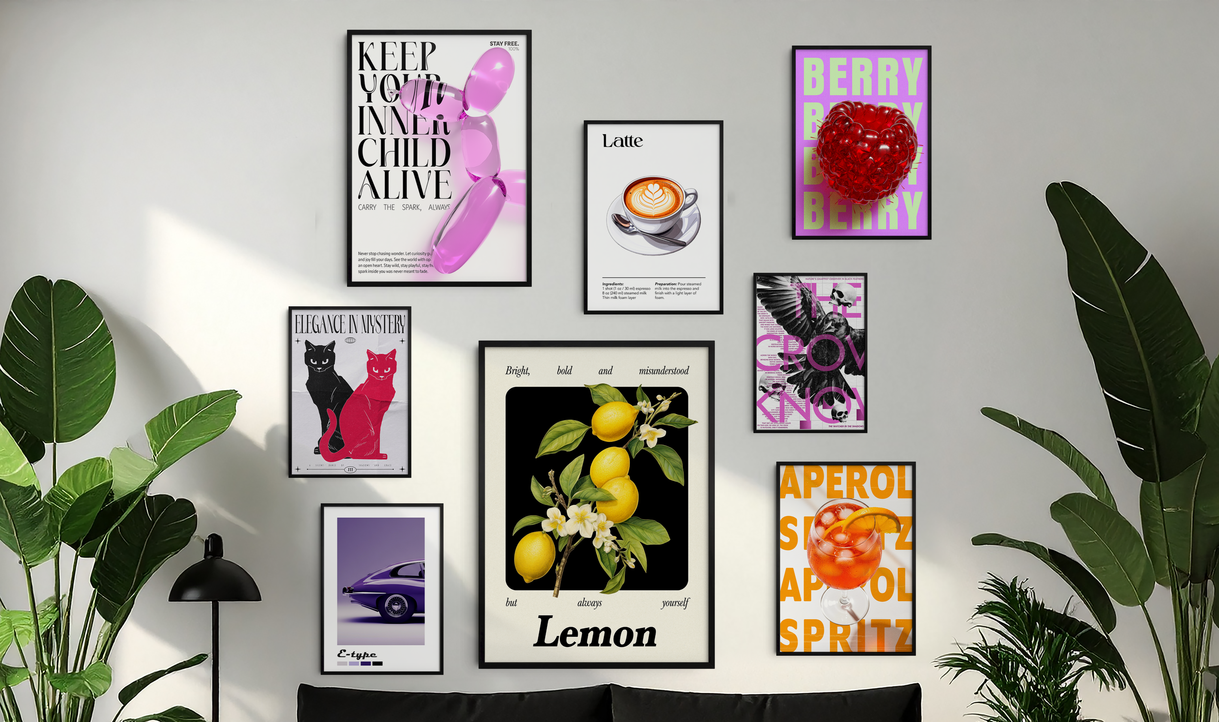 A stylish living room with a black sofa, coffee table, and large green plants. Above the sofa is a gallery wall featuring nine diverse framed art prints, including a pink balloon dog, a coffee cup, lemons, and a red berry.