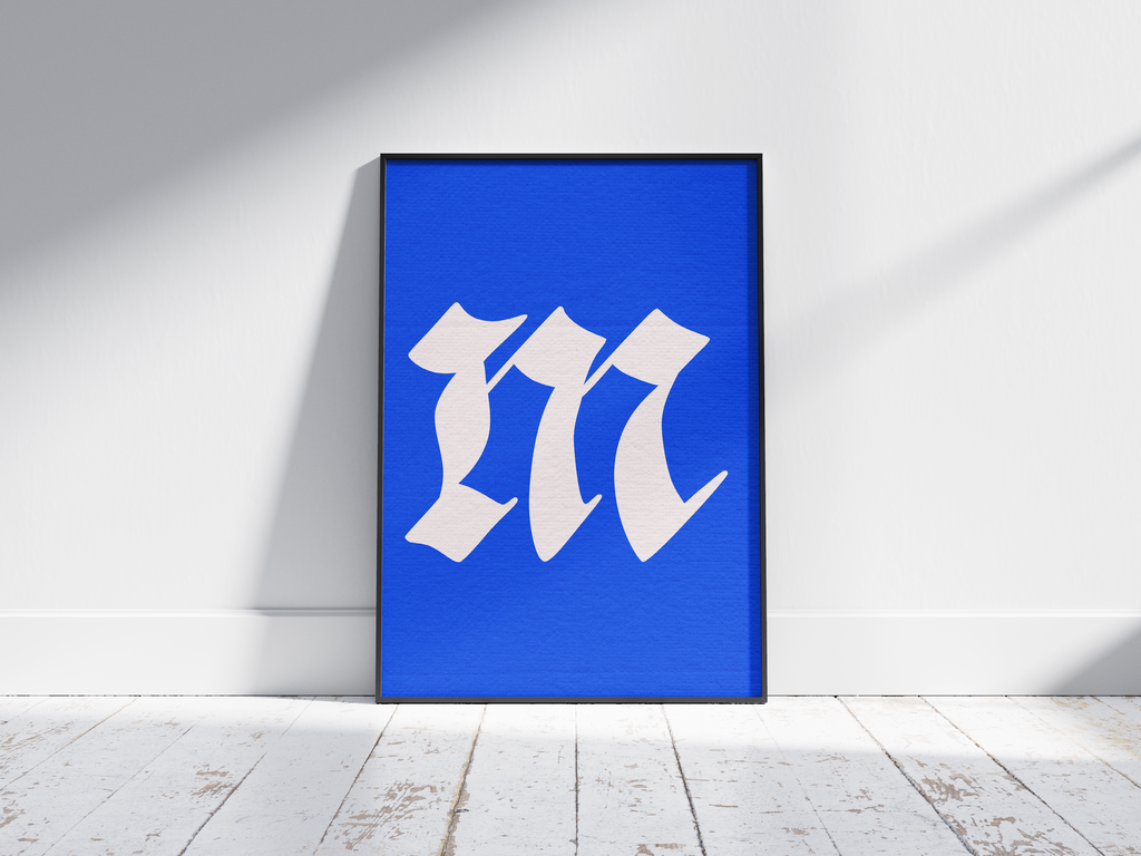 Dramatic and elegant Gothic calligraphy alphabet letter M poster, featuring a creamy white blackletter 'm' on a bright electric-blue background. Perfect wall art for libraries, sophisticated offices, or gallery walls with a vintage, historic, and bold aesthetic.