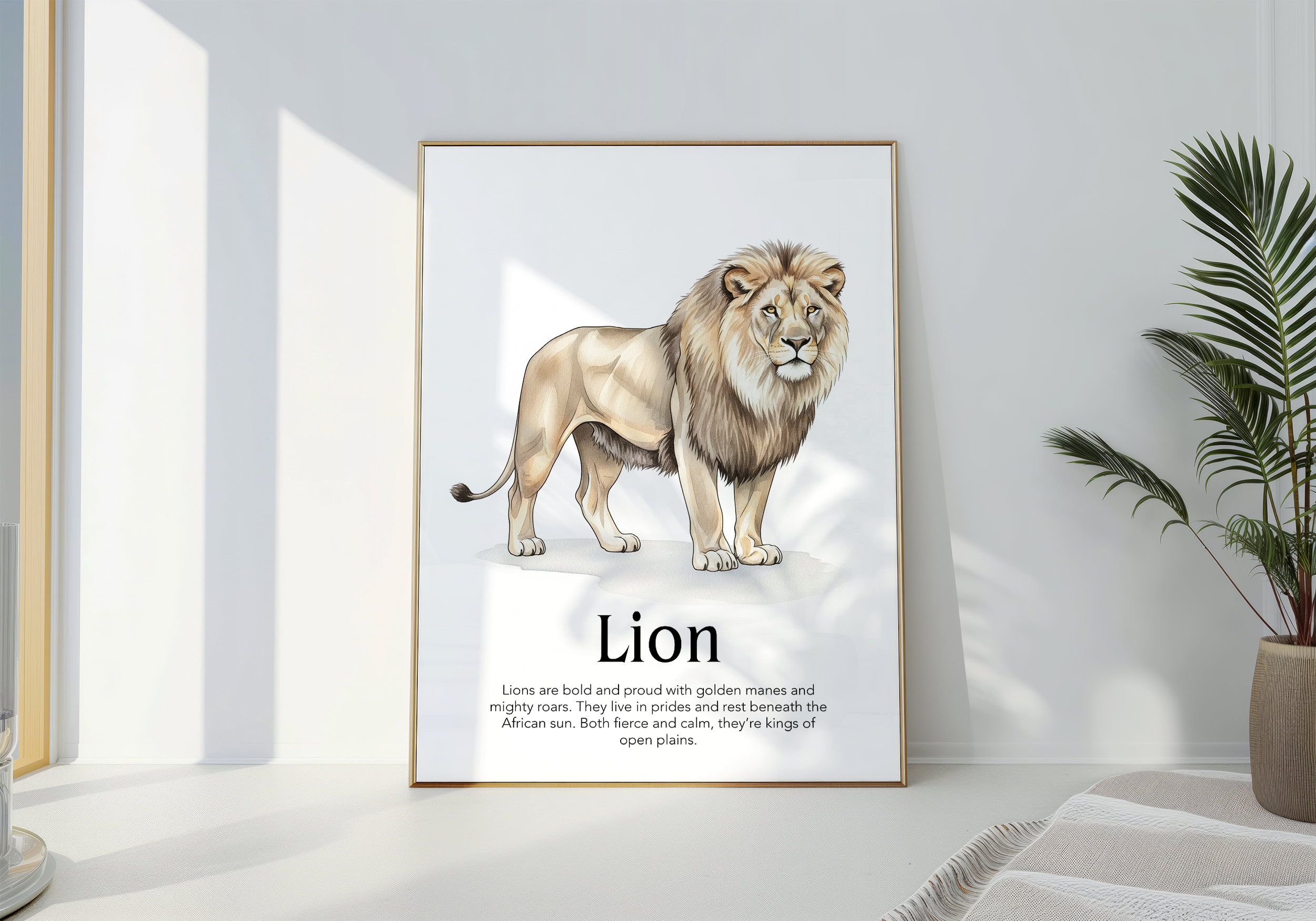A gold-framed print of a realistic illustration of a standing male lion with the title "Lion" and descriptive text, leaning against a white wall in a bright room next to a potted plant.