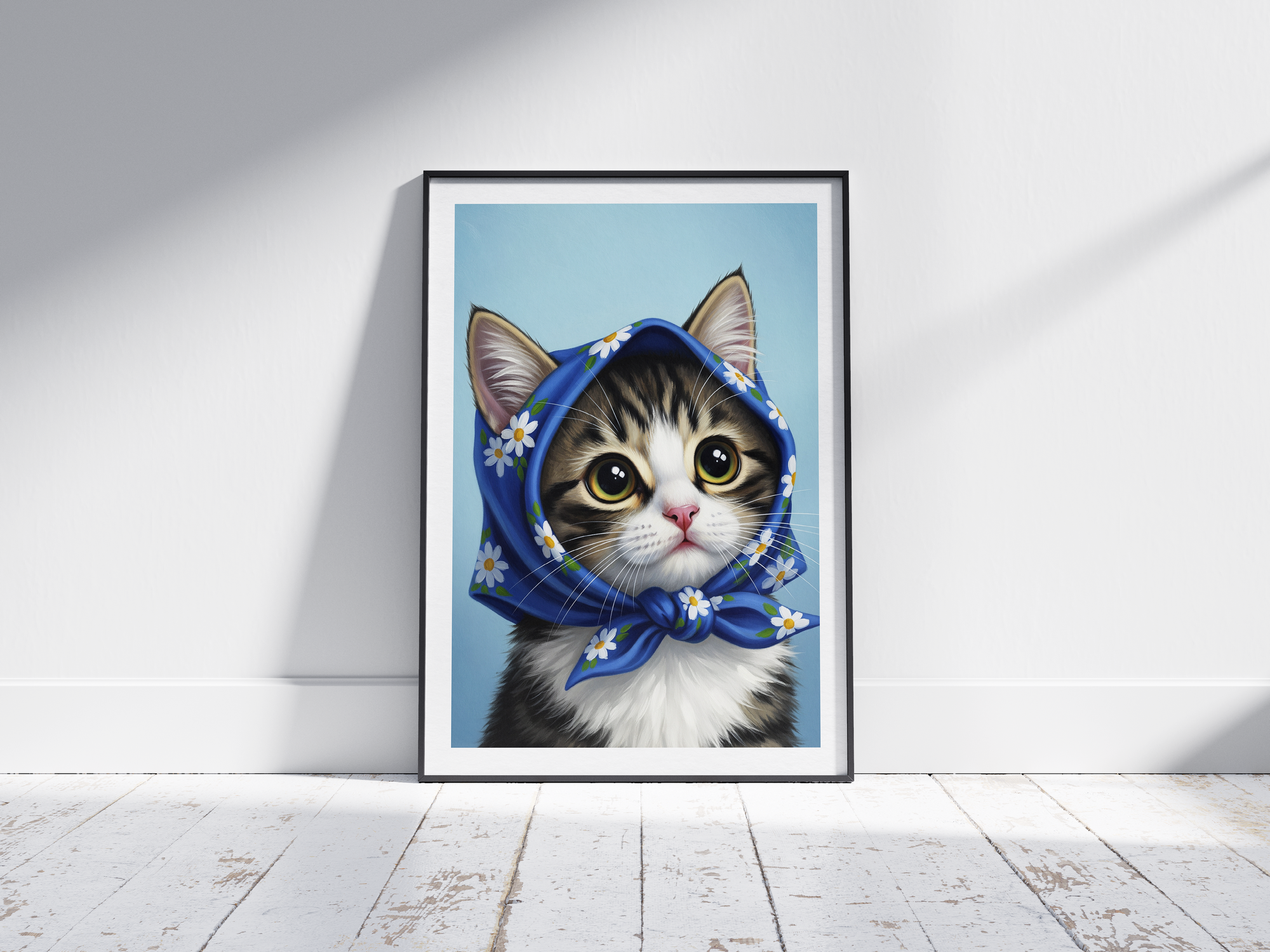 A single framed poster of a tabby kitten wearing a blue, floral babushka scarf. This whimsical art print is ideal for a nursery, kid's room, or bedroom, adding a cozy and charming touch.