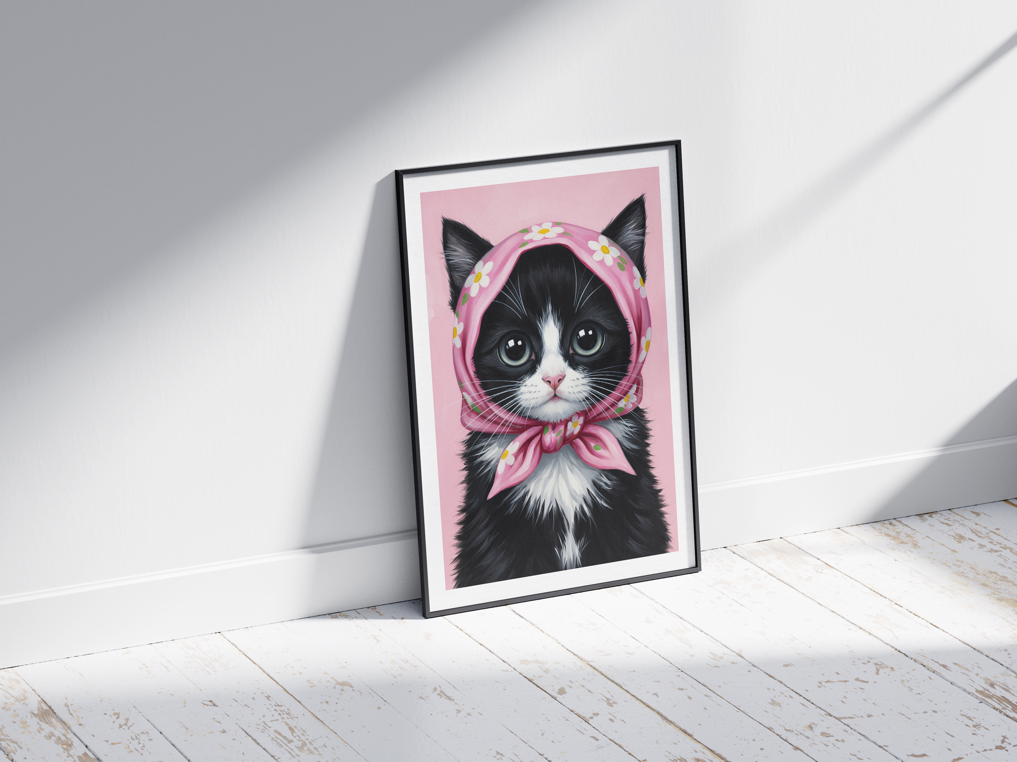 A single framed poster of a black and white kitten wearing a pink, floral babushka scarf. This whimsical art print is ideal for a nursery, kid's room, or bedroom, adding a cozy and charming touch.