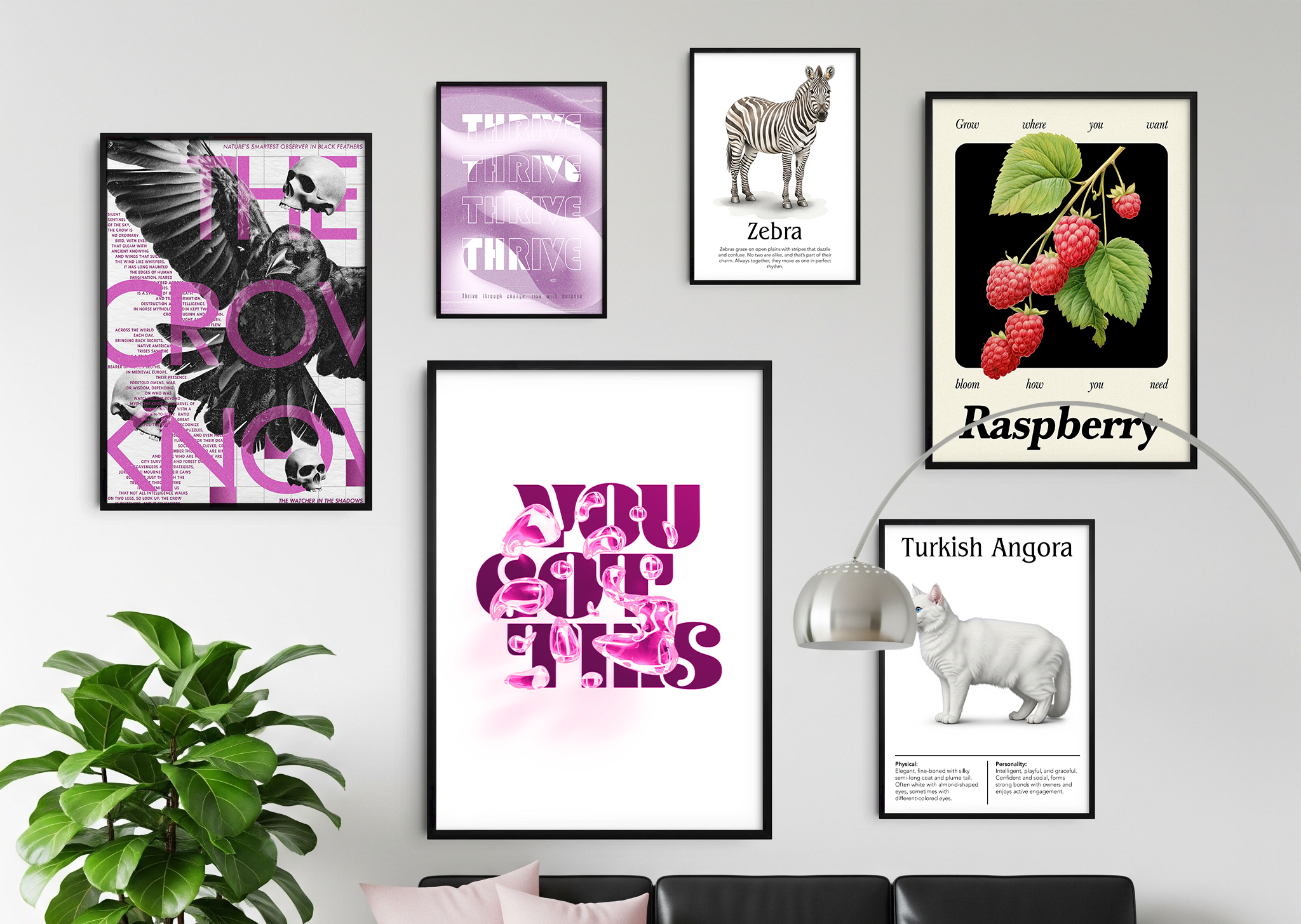 A contemporary living room featuring a black leather sofa with light pink pillows, centered against a white wall. Above the sofa, a gallery wall displays six framed art prints of various sizes and styles, including a large abstract design with purple text, an image of a zebra, a branch of raspberries, an illustration of a Turkish Angora cat, and a large black and white print with an eagle and skulls. A tall, large-leafed plant in a pink pot stands to the left of the sofa. A modern silver floor lamp with an 