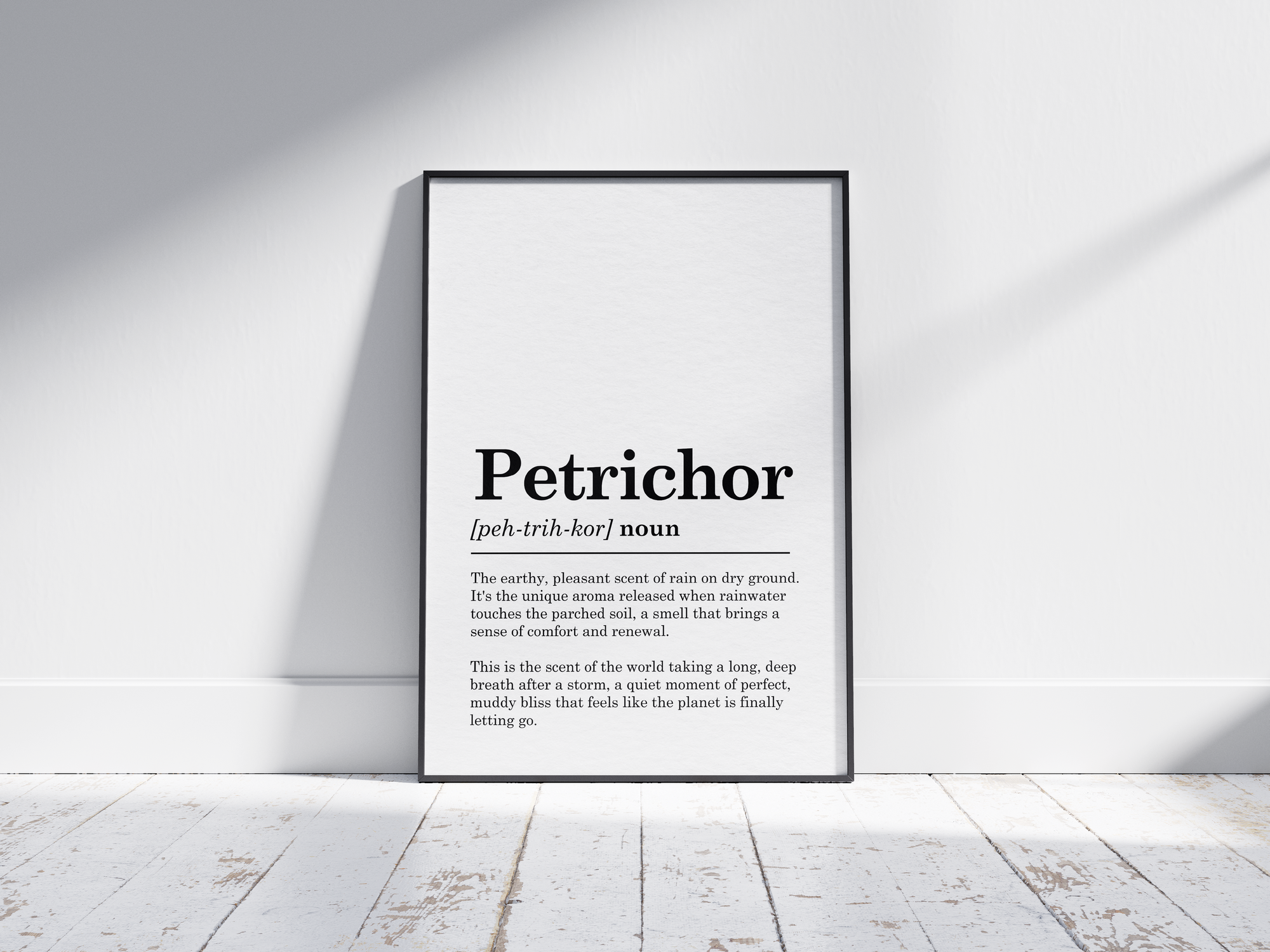Minimalist Petrichor definition poster featuring elegant black text on a crisp white background. This evocative and soothing piece of wall art is perfect for adding a sense of calm and nature to living rooms, studies, or gallery walls with a modern or minimalist aesthetic.