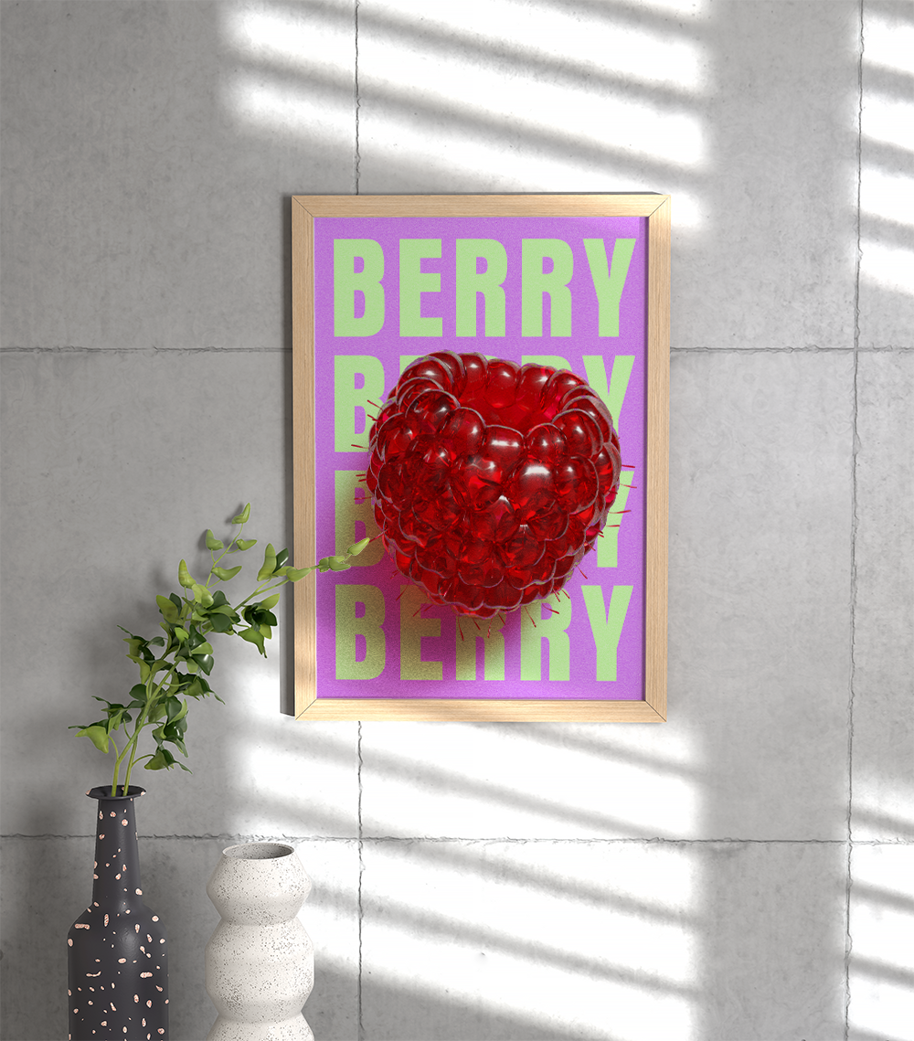 A striking, contemporary Pop Art print showcasing a glossy, textured red raspberry against a vibrant purple background with repeating lime green "BERRY" typography. This bold piece is great for a modern kitchen or statement wall. The framed print is propped against a concrete-textured wall, complemented by minimalist black and white speckled vases with green branches, all accented by strong natural sunlight and window shadows.