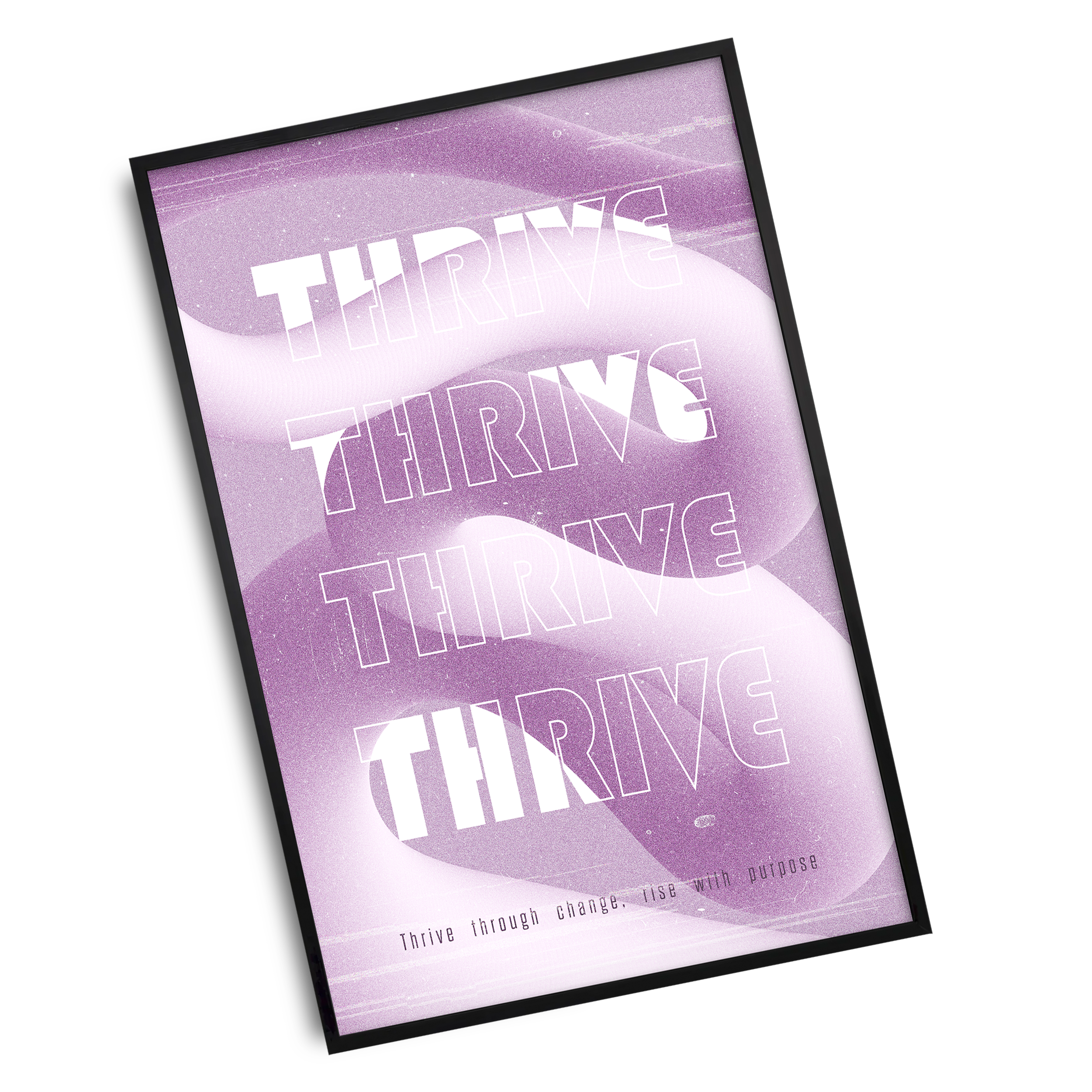 A framed art print features the word "THRIVE" repeated four times in bold white outline font, set against a gradient background of various shades of purple with a swirling, textured effect. At the bottom, smaller text reads: "Thrive through change. Live with purpose." The poster has a black frame and is angled on a grey surface.