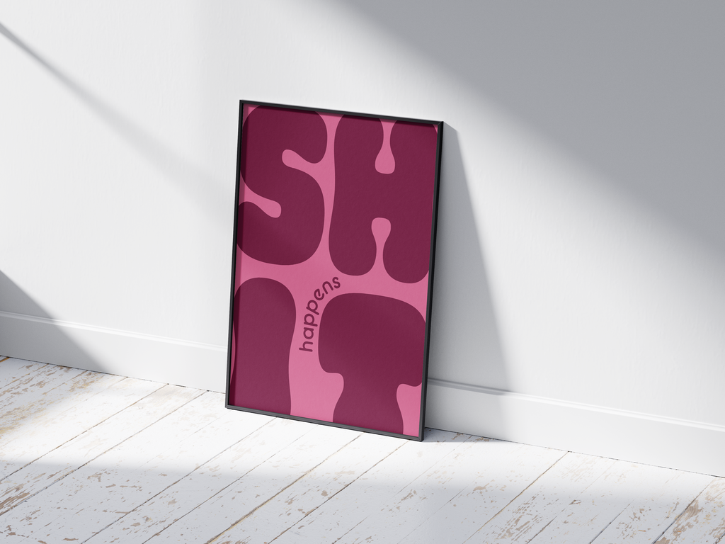 Bold "Shit Happens" modern art poster featuring large, wavy purple typography on a pink background, printed on semi-gloss sustainable paper. Perfect wall art for living rooms, offices, or contemporary interiors with a humorous and confident aesthetic.