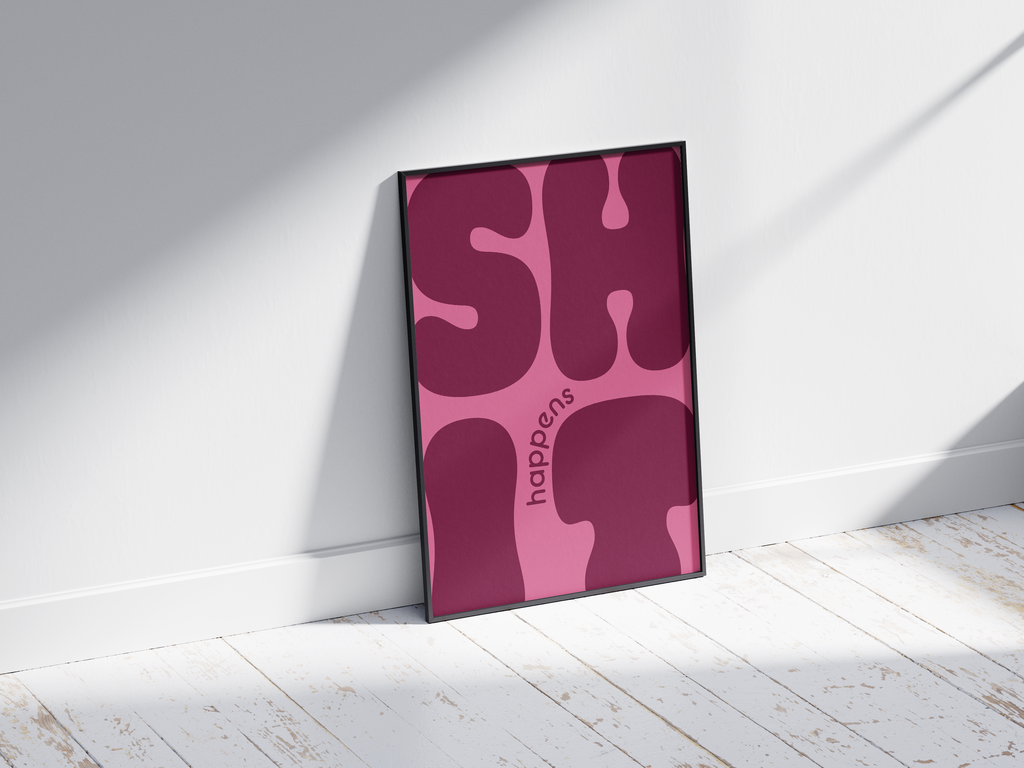 Bold "Shit Happens" modern art poster featuring large, wavy purple typography on a pink background, printed on semi-gloss sustainable paper. Perfect wall art for living rooms, offices, or contemporary interiors with a humorous and confident aesthetic.