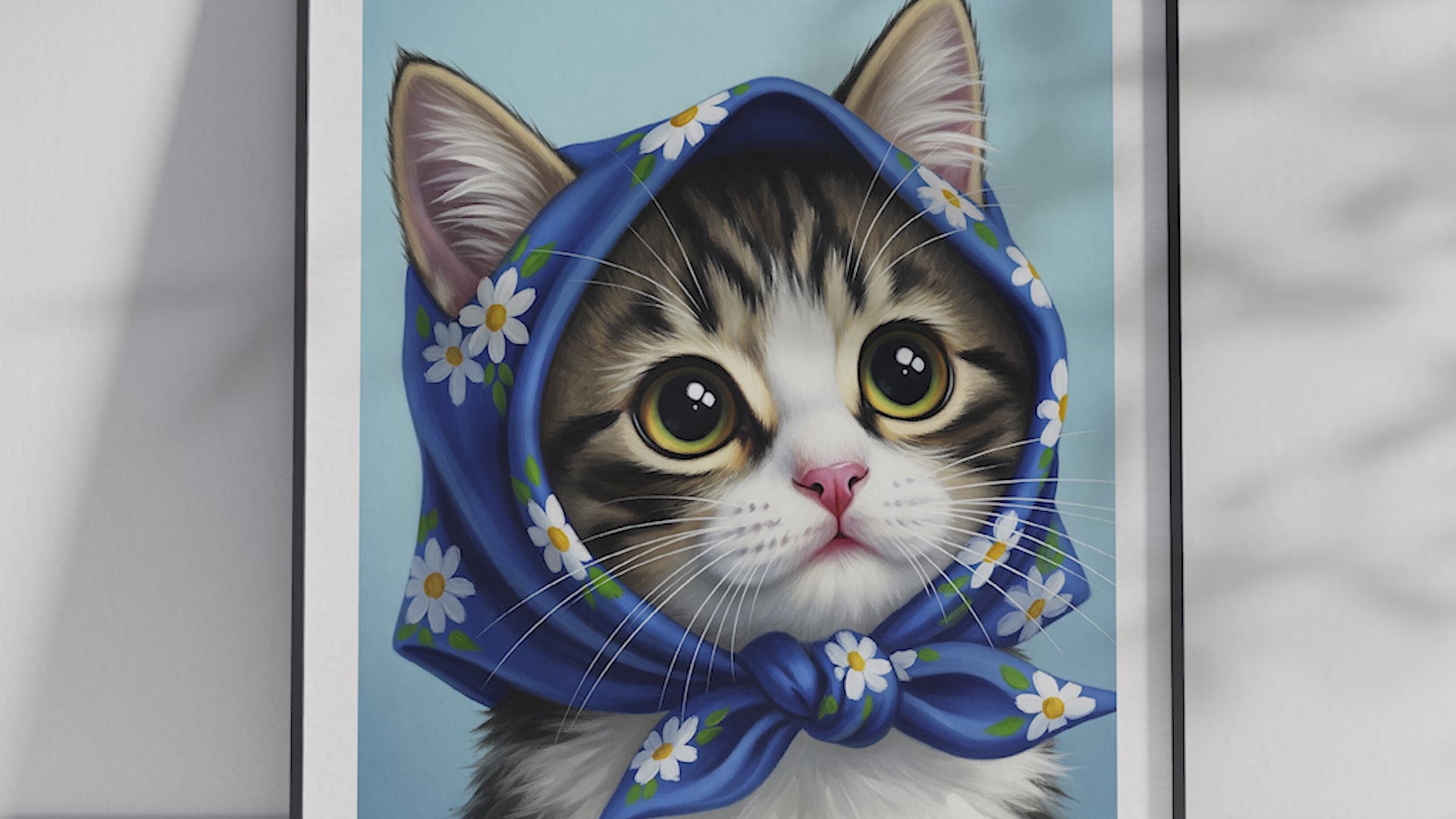 A single framed poster of a tabby kitten wearing a blue, floral babushka scarf. This whimsical art print is ideal for a nursery, kid's room, or bedroom, adding a cozy and charming touch.