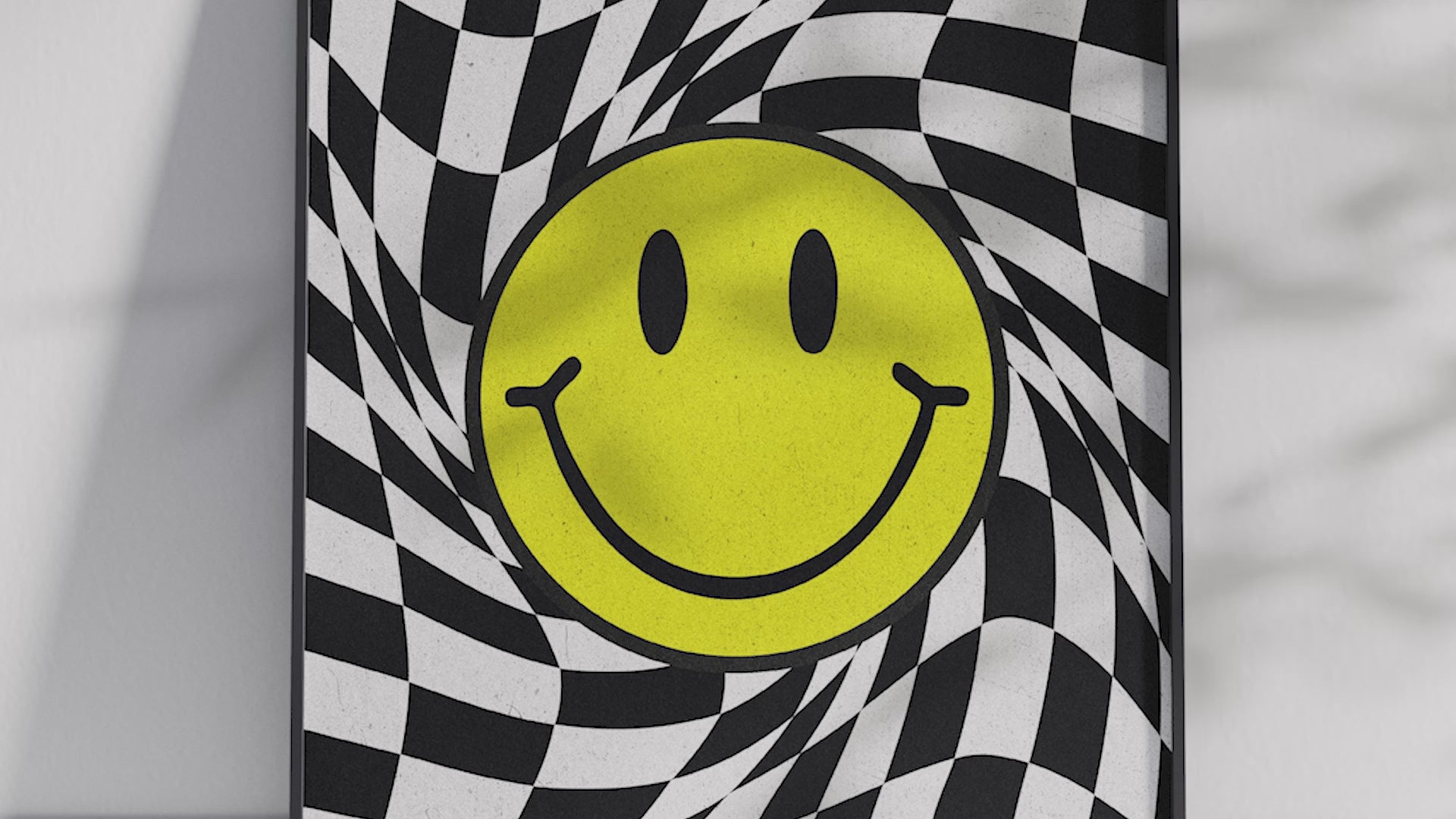 Vibrant "Trippy Checkered Smiley Art Poster" featuring a yellow smiley face on a distorted black and white checkerboard background, creating an optical illusion. Printed on semi-gloss sustainable paper, this modern pop art is perfect for living rooms, game rooms, or creative spaces, adding a unique and playful touch.