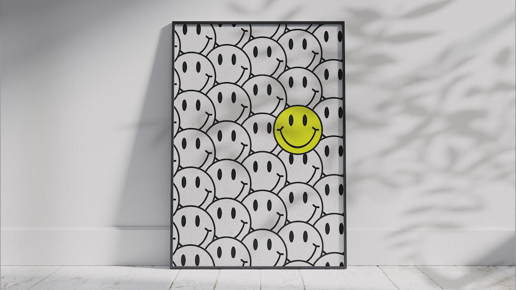 Vibrant "Bright Smiley Grid Quote Art Poster" featuring the text "Joy begins with a smile" and a structured grid of yellow and outlined smiley faces. Printed on semi-gloss sustainable paper, this modern motivational wall art is perfect for living rooms, bedrooms, or offices, encouraging positivity and happiness.